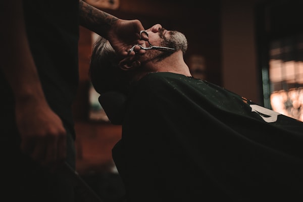 Barber-style precision cut on textured hair